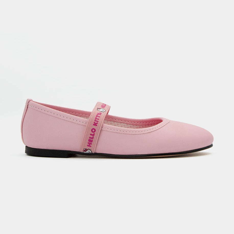 Zapato Mary Jane rosa pastel con suela negra y correa estampada de Hello Kitty.