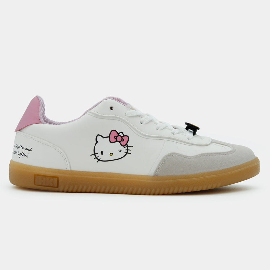 Tenis blancos Hello Kitty para mujer con suela de goma color miel y parche lateral del personaje.
